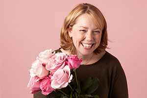 wedding flowers: Caroline Grimble – Bloom & Wild’s Lead Florist – with a bouquet