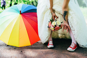 Bride with colourful umbrella 