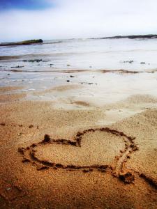 heart-sand-writing-flickr-neal-fowler_0.jpg