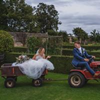Couple on tractor outside of County Durham hotel