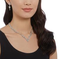 The Swarovski Diapason Rhodium and Clear Crystal V All Around Leaf Necklace Swarovski Diapason Leaf Medium Rhodium and Clear Crystal Earrings, and Necklace