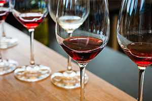 Glasses of wine on table